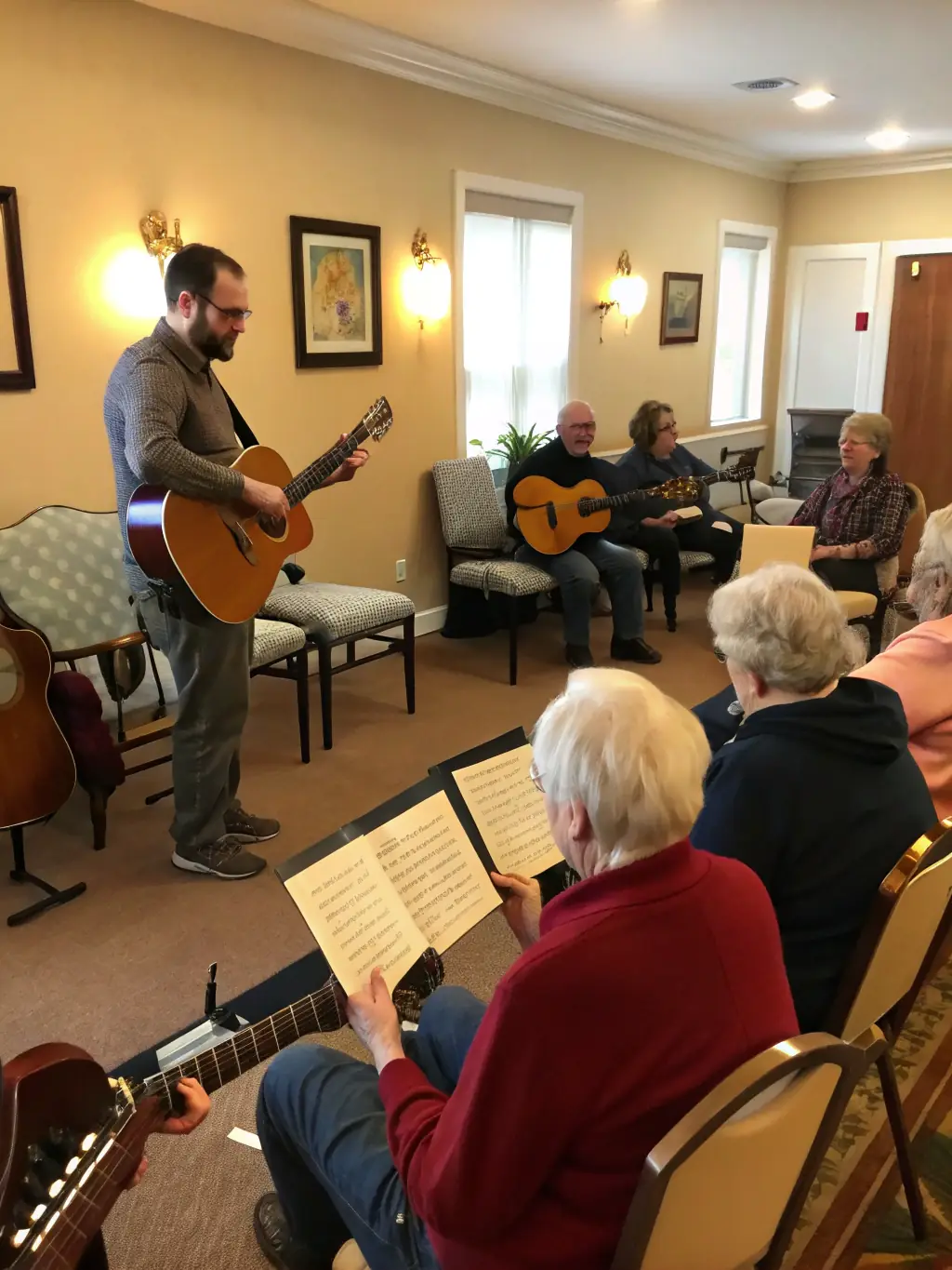 A picture of a skill-sharing session at WOOD FACTORY, with experienced musicians mentoring younger participants on various instruments and techniques.